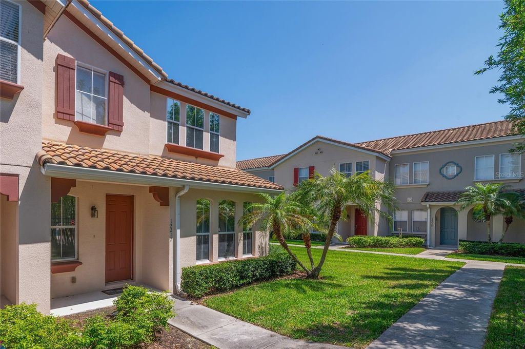 Photo of 12212 Triton Ln #11, Orlando, FL 32837 (MLS # O6395136)