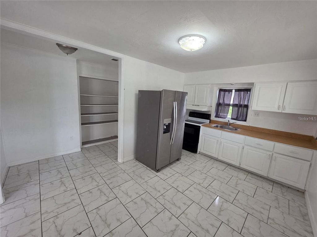 Photo of 207 Hibiscus Street, Tarpon Springs, FL 34689 (MLS # TB8439847)