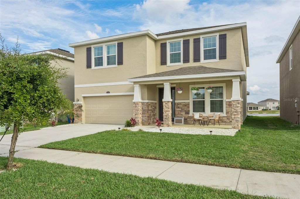Photo of 9119 Forge Breeze Loop, Wesley Chapel, FL 33545 (MLS # TB8507452)