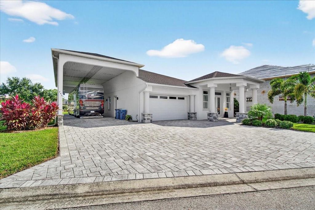 Photo of 743 Teaberry Trail, Polk City, FL 33868 (MLS # L4956869)