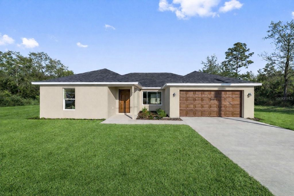 Photo of 1365 SW Halfmoon Drive, Dunnellon, FL 34431 (MLS # O6405599)