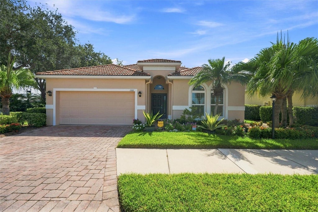 Photo of 7707 33rd Street E, Sarasota, FL 34243 (MLS # A4703322)
