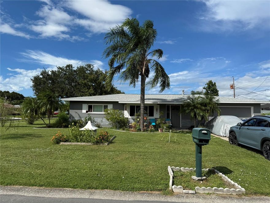 Move in ready corner lot Largo home centrally located in Pinellas County! Total square footage over 2000, 2 bedrooms. 2 bathrooms, double garage, large great room with backyard access, 0.22-acre property with new roof and Central AC/heat system! No Flood Insurance required and no hurricane damage with high elevation!  Great schools and amazing Eagle Park within walking distance with walking trails, dog parks & awesome playgrounds for Kiddos!  Close to shopping centers, restaurants, easy access in Tampa Bay area to beaches!
