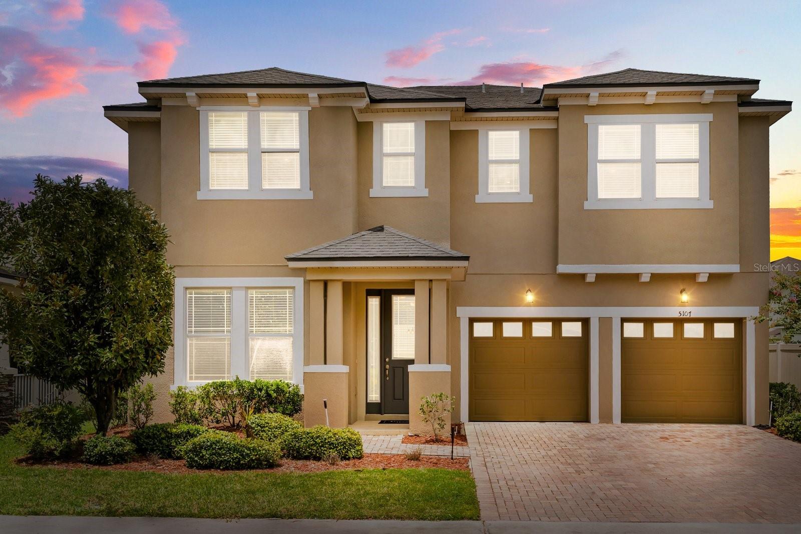 Located in the highly sought-after gated community of Millenia Park, 5107 Longmeadow Park Street presents a refined blend of modern design, thoughtful functionality, and strong investment value. Millenia Park is a well-designed residential community featuring 24/7 secured entry and a host of amenities, including a resort-style pool, clubhouse, park, playground, dog park, and paved walking trails. Situated just minutes from downtown Orlando, the Mall at Millenia, and International Drive, residents enjoy convenient access to major highways, dining, entertainment, and world-class attractions—including the upcoming Epic Universe by Universal Orlando. Inside, the home welcomes you with a flexible layout designed for everyday living and entertaining. A spacious front living area is well-suited for hosting, while the open-concept kitchen, breakfast nook, and family room form the heart of the home. Highlights include a large central island with granite countertops, 42-inch cabinets with crown molding, a walk-in pantry, and a brand-new stainless steel refrigerator and stove. Upstairs, the primary suite includes a walk-in closet and an en-suite bathroom with dual sinks, a soaking tub, and quartz countertops. Three additional bedrooms offer generous space and closet storage, and the shared main bath features dual vanities. A second-floor laundry room adds everyday convenience. A versatile loft provides additional space for a home office, fitness area, or media room. Recent improvements enhance the home’s appeal: never used/newly installed fridge and range, fresh interior and exterior paint (2024), newly installed vinyl flooring throughout the second level and staircase, upgraded light fixtures, new window coverings, and bathroom enhancements including a new toilet in the primary suite. With its established prime location near major employment hubs, theme parks, and shopping destinations, this property offers exceptional flexibility as either a primary residence or an investment opportunity.