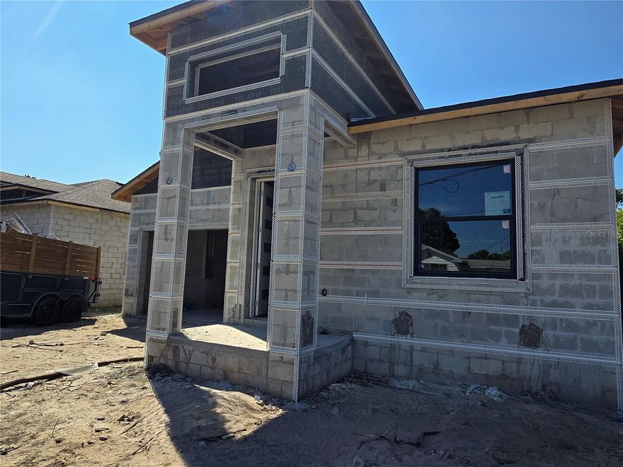 Under Construction. HINT**SAVE IT IN FAVORITES TO WATCH THE PROGRESS THROUGH PHOTOS UP TO THE GRAND FINALE. This Modern home is expected to be completed in November 2025.Featuring  all the high-end impressive finishes at a very COMPETITIVE PRICE. Don't miss this one....NO HOA FEE & NO FLOOD insurance required! One of only a few new homes with a full 2 CAR GARAGE for private off street parking. Kick back and relax in your private fenced backyard while you barbecue on the patio with friends. Bike or kayak from Tampa Riverwalk or to take the dog for a scenic walk along the river. Hungry? The community is part of the North Hyde Park neighborhood, which is a short drive along Tampa's Bayshore Boulevard to the trendy Hyde Park Village to sit and have a bite on an outside patio. Catch a movie in your living room watching a big screen tv in its built-in feature wall or gather for a late-night snack at the oversized island in your contemporary kitchen with stone waterfall counters and modern finishes. Plenty of storage with shaker cabinets stretching all the way to the ceiling and let’s not forget the additional corner pantry with shelving for practical storage .The primary suite has a private and spacious bathroom with dual sinks & stone counters, modern style mirrors and sleek oversized, tiled shower. Additionally, Extra bonus of the walk-in closet with upgraded closet organizers. Located near the Westshore area where you’ll discover many newly constructed apartments, townhomes & stately homes sprinkled here and there. A short drive to Tampa Armature works or Oxford Exchange. Easy commute to Tampa International Airport, The Tampa Cruise Port, Amalie Arena, restaurants and shops at Westshore Plaza, International Mall, Picnic Island, Tampa's Bayshore Boulevard, Historical Hyde Park as wells as Tampa University and MacDill Airforce Base.