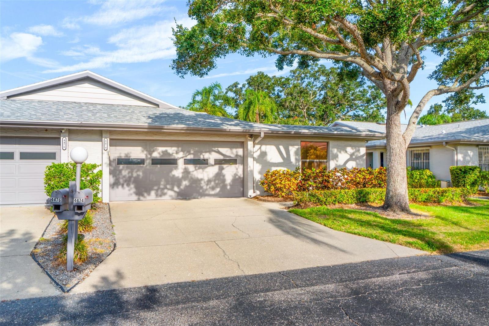 Rarely available 2100 sq ft, 3-bedroom, 3-bath villa with a 2-car garage and new 2025 roof in the sought-after, pet-friendly community of Center Gate Estates. This spacious and thoughtfully designed home features a split floor plan with soaring cathedral ceilings, formal living and dining areas, and a generously sized family room perfect for entertaining. The large kitchen includes a breakfast bar and pantry. A rare third full bathroom adds exceptional value and flexibility, makes all bedrooms en-suites, and is ideal for multigenerational living or guests. The oversized primary suite offers comfort and privacy, step through sliding glass doors to a 32?x10? fenced and screened lanai, perfect for morning coffee, reading, relaxing, or dining al fresco. Additional features include an interior laundry room with washer and dryer, and direct access to the community pool and cabana just steps from your back door. This centrally located community allows up to two small pets (under 30 lbs), has no age restrictions, and is close to I-75, Doctors Hospital, shopping, parks, golf, dining, top-rated schools, downtown Sarasota, and the world-famous Siesta Key Beach.