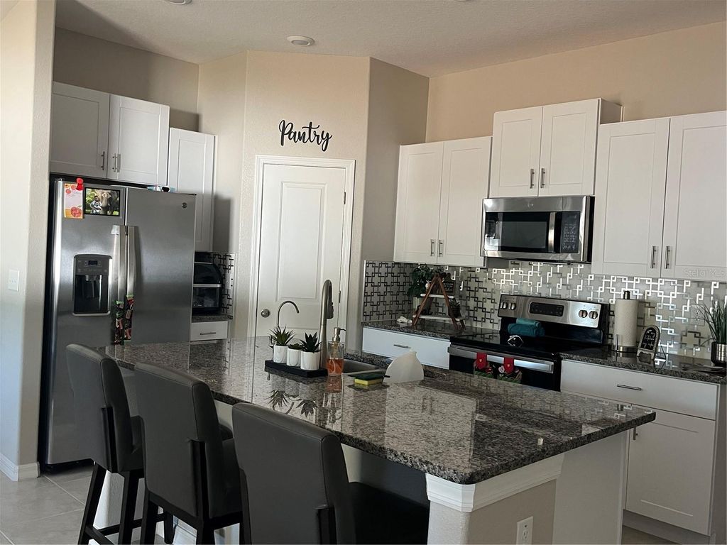 Photo of 13403 Willow Bluestar Loop, Riverview, FL 33579 (MLS # TB8450839)