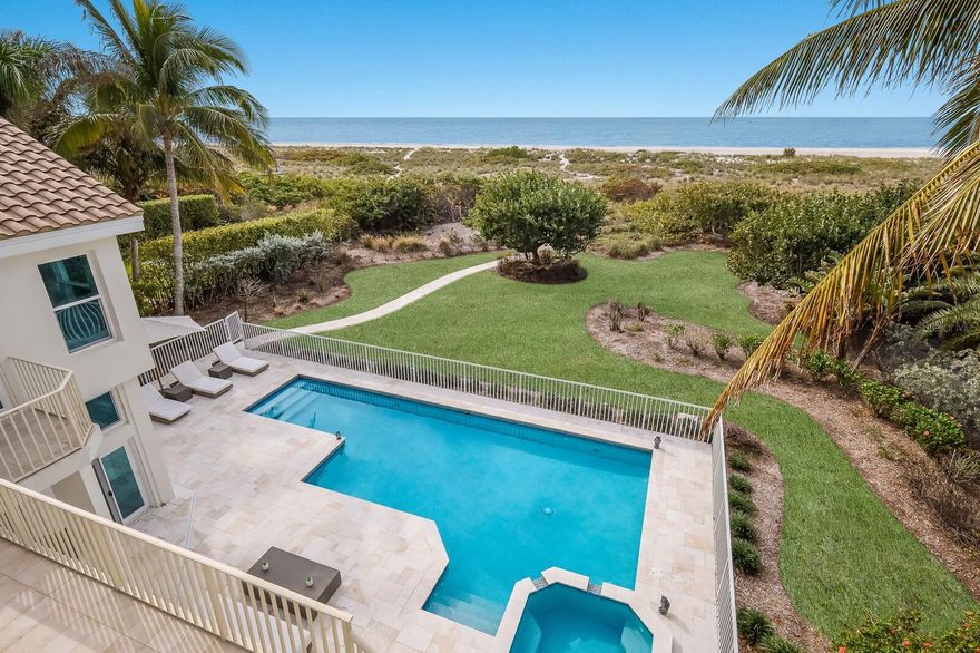Experience the pinnacle of coastal luxury at this magnificent 4 bedroom beachfront residence on Longboat Key. Nestled along the pristine shores of the Gulf of Mexico,  this remarkable home offers the perfect blend of contemporary style, relaxation, and elegance. With breathtaking views of the Gulf, every evening becomes a masterpiece as you watch the sun slowly dip below the horizon from the comfort of your private oasis. Immerse yourself in the heated beachfront pool or soak in the hot tub, letting the soothing sounds of the waves envelop you. This residence boasts a spacious 4-car garage, providing ample space for your vehicles and watercraft, ensuring you're always ready for a day of adventure on the water. Inside, the open and airy living spaces are thoughtfully designed with an emphasis on maximizing views and creating a warm, inviting atmosphere. The gourmet kitchen, adorned with top-of-the-line appliances and a spacious island, invites culinary creativity, whether you're whipping up a romantic dinner for two or hosting a grand celebration. With five beautifully appointed bedrooms, there's ample room for family and friends to share in this coastal paradise. The master suite is a sanctuary of comfort and style, featuring its own private balcony for you to savor the colors of the sunset and the gentle ocean breeze. The ensuite bathroom offers a spa-like experience, complete with a luxurious soaking tub. But the real magic lies just beyond your doorstep. Step onto the sugar-white sands of Longboat Key, where you can take long walks along the beach, collecting seashells and creating memories. The beach is your backyard, inviting you to swim, sunbathe, or simply enjoy the tranquil sounds of the sea.  Longboat Key offers a unique blend of natural beauty and cultural delights, from exploring nearby parks and wildlife preserves to savoring world-class cuisine at local restaurants. Whether you're a nature enthusiast, an art lover, or a gourmet connoisseur, this location offers something for everyone.  This 5-bedroom beachfront haven on Longboat Key isn't just a home; it's an invitation to a life of luxury, where every day is filled with breathtaking sunsets, beachside strolls, and romantic moments. Discover the ultimate coastal lifestyle and create unforgettable memories in this exquisite retreat." Bedroom Closet Type: Walk-in Closet (Primary Bedroom).