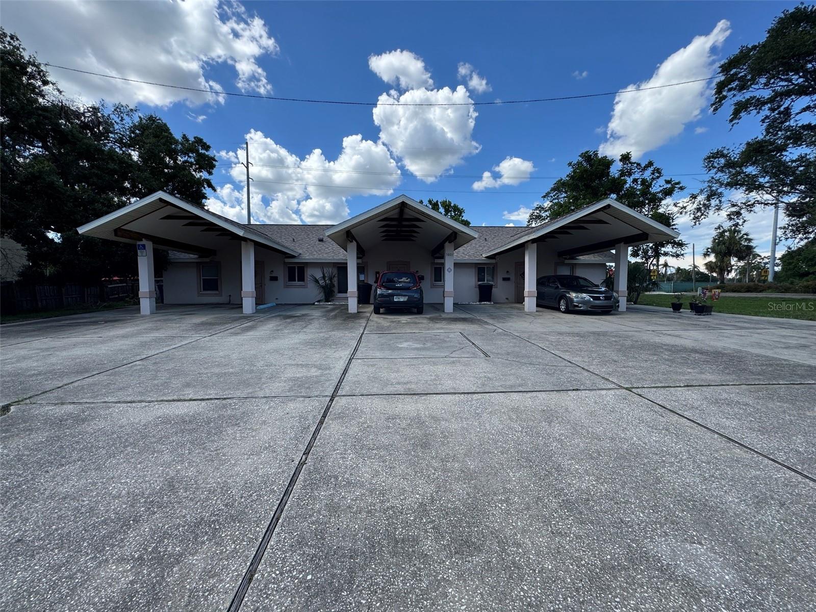 Unique investment opportunity in the heart of Pasadena On The Gulf! This fully accessible, single-story triplex was built in 1994 and offers three well-designed 2-bedroom, 1-bathroom units, each with approximately 850 sq ft of living space. Set on a generous 0.26-acre lot with a total building size of 2,541 sq ft, the property is ideal for both long-term rental income and specialized housing needs. This is a true value-add property with strong fundamentals and excellent upside potential through strategic updates or rent increases. Each unit is wheelchair-accessible, featuring step-free entrances, wide doorways, and open floor plans that comfortably accommodate residents with mobility needs. A standout feature is the three covered parking spaces, each designed to fit high-top vans, making it perfect for tenants requiring specialized vehicles. Located directly on the Pinellas Trail, this property offers easy access to outdoor recreation and is just minutes from downtown Gulfport, St. Petersburg, and the Gulf beaches. Families will appreciate the nearby schools, including Bear Creek Elementary (0.3 mi), Azalea Middle School (2.9 mi), and Boca Ciega High School (0.3 mi). Whether you're an investor looking for steady cash flow or a buyer seeking a unique multi-unit property with built-in accessibility, this value-add triplex delivers on location, functionality, and long-term growth potential. Two of the units are like kind to the pictures, one of the units is in need of a full rehab.