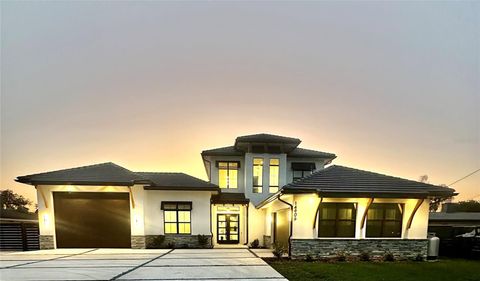 Photo of 14906 N Rome Avenue, Tampa, FL 33613 (MLS # TB8440579)