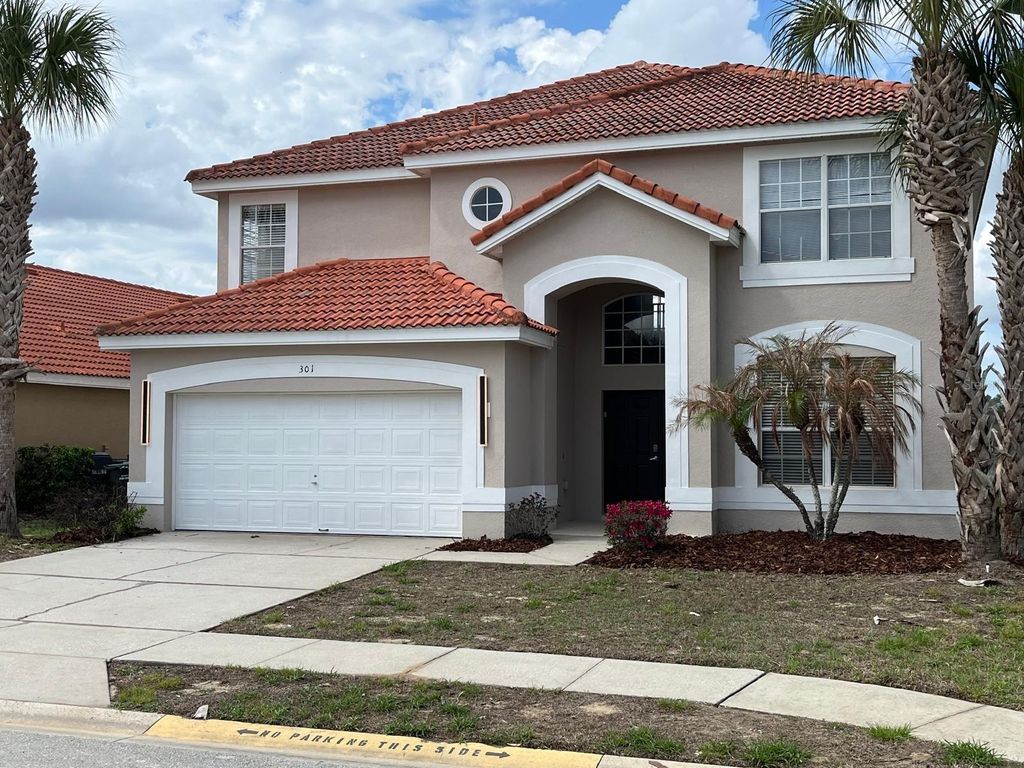 Photo of 301 Rosso Drive, Davenport, FL 33837 (MLS # S5146143)