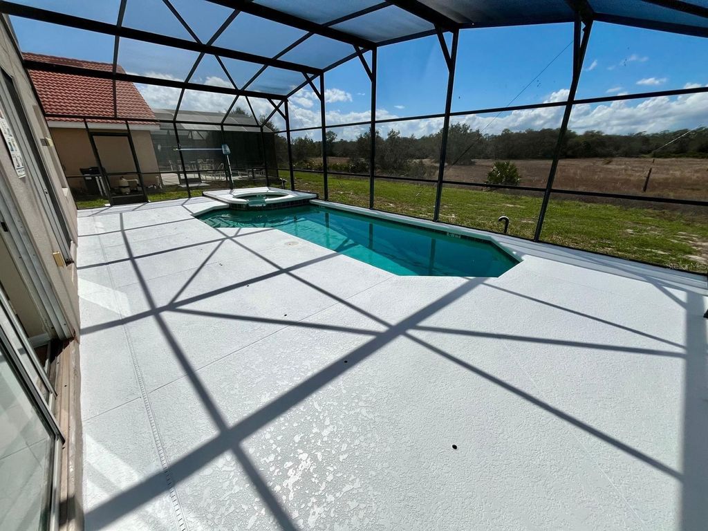 Photo of 301 Rosso Drive, Davenport, FL 33837 (MLS # S5146143)