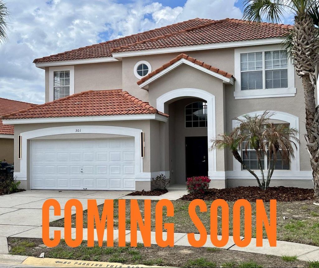 Photo of 301 Rosso Drive, Davenport, FL 33837 (MLS # S5146143)