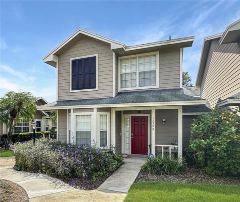 Photo of 12308 Shady Spring Way #107, Orlando, FL 32828 (MLS # O6347153)