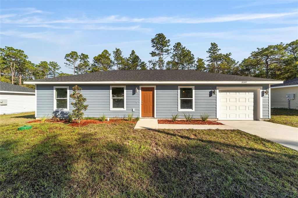 Photo of 24071 NW Aspen Lane, Dunnellon, FL 34431 (MLS # OM720750)