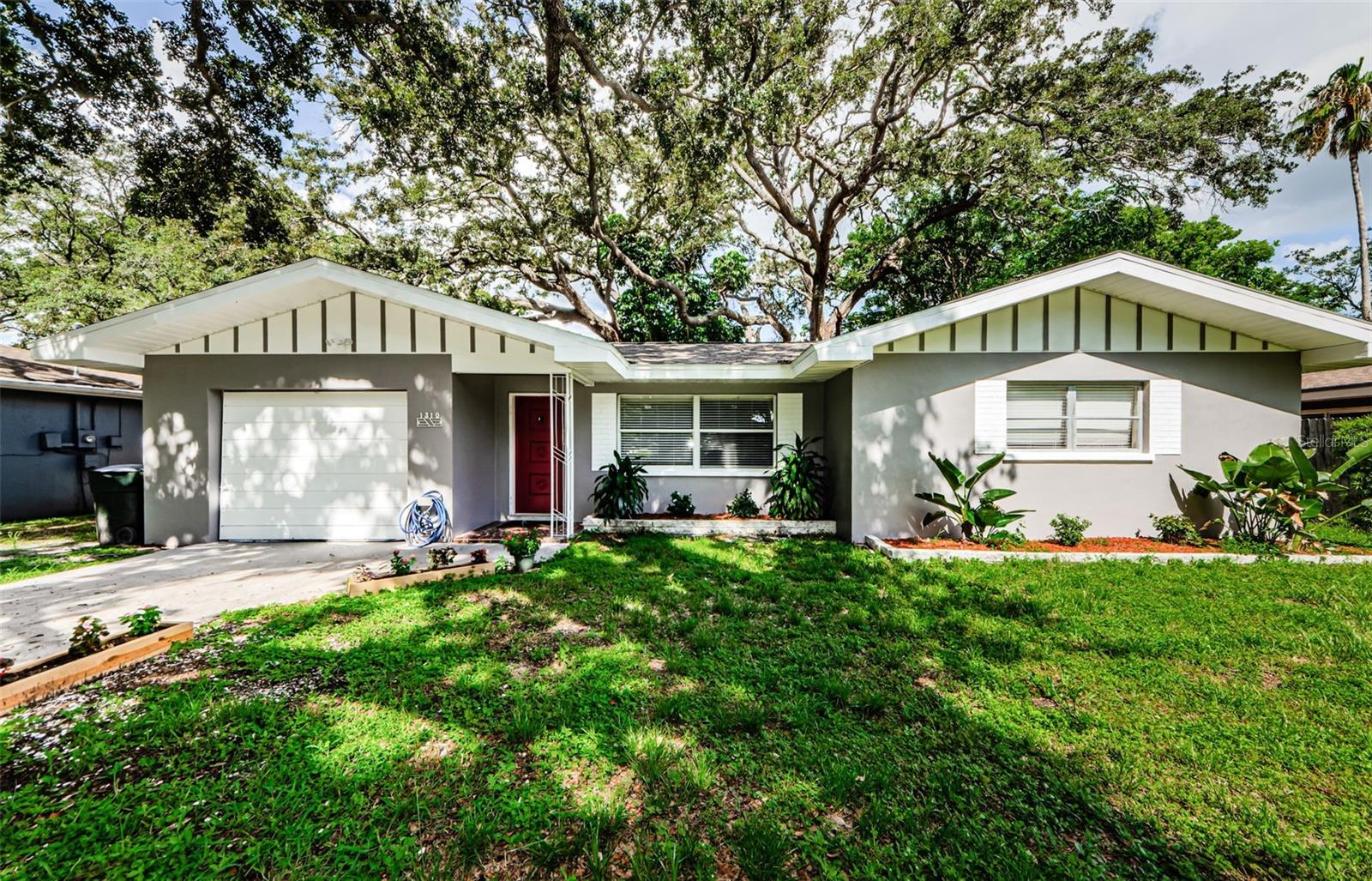 Adorable, completely remodeled home in the heart of Dunedin! Just a half a mile from all that beautiful downtown Dunedin has to offer! Loads of eateries, breweries, shopping, waterfront dining, biking or walking on the Pinellas Trail, and golf cart living. This cutie is ready for a tenant immediately. Brand new kitchen features white, shake cabinetry and granite countertops. Brand new appliances! No carpeting at all. The entire home has been finished with luxury vinyl plank flooring and 6 in. baseboards. Larger bathroom has a new vanity with dual sinks plus a shower and bathtub. Secondary bathroom includes a stand-up shower and new vanity. Laundry hook-ups inside! As well as spacious living room and dinette, there is an extra bonus room perfect for in-home office, children's playroom, game room, or extra living space. Enjoy the outdoor Florida lifestyle in a private screened-in lanai and a very large, fenced-in yard. Pets are welcome on approval. Start living that Dunedin dream now!