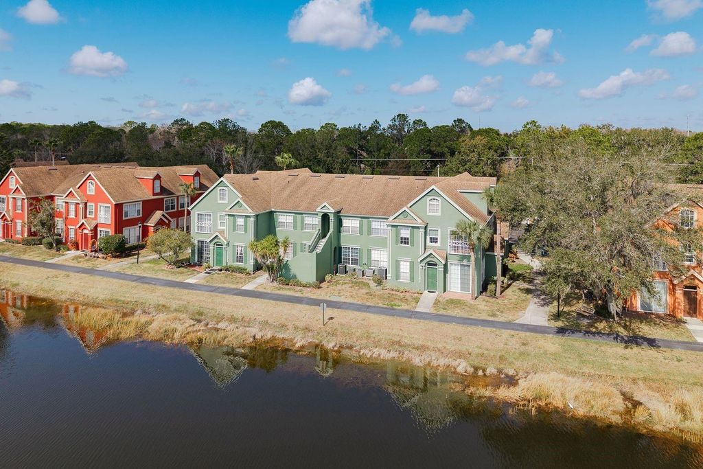 Photo of 9170 Lake Chase Island Way #9170, Tampa, FL 33626 (MLS # TB8462271)