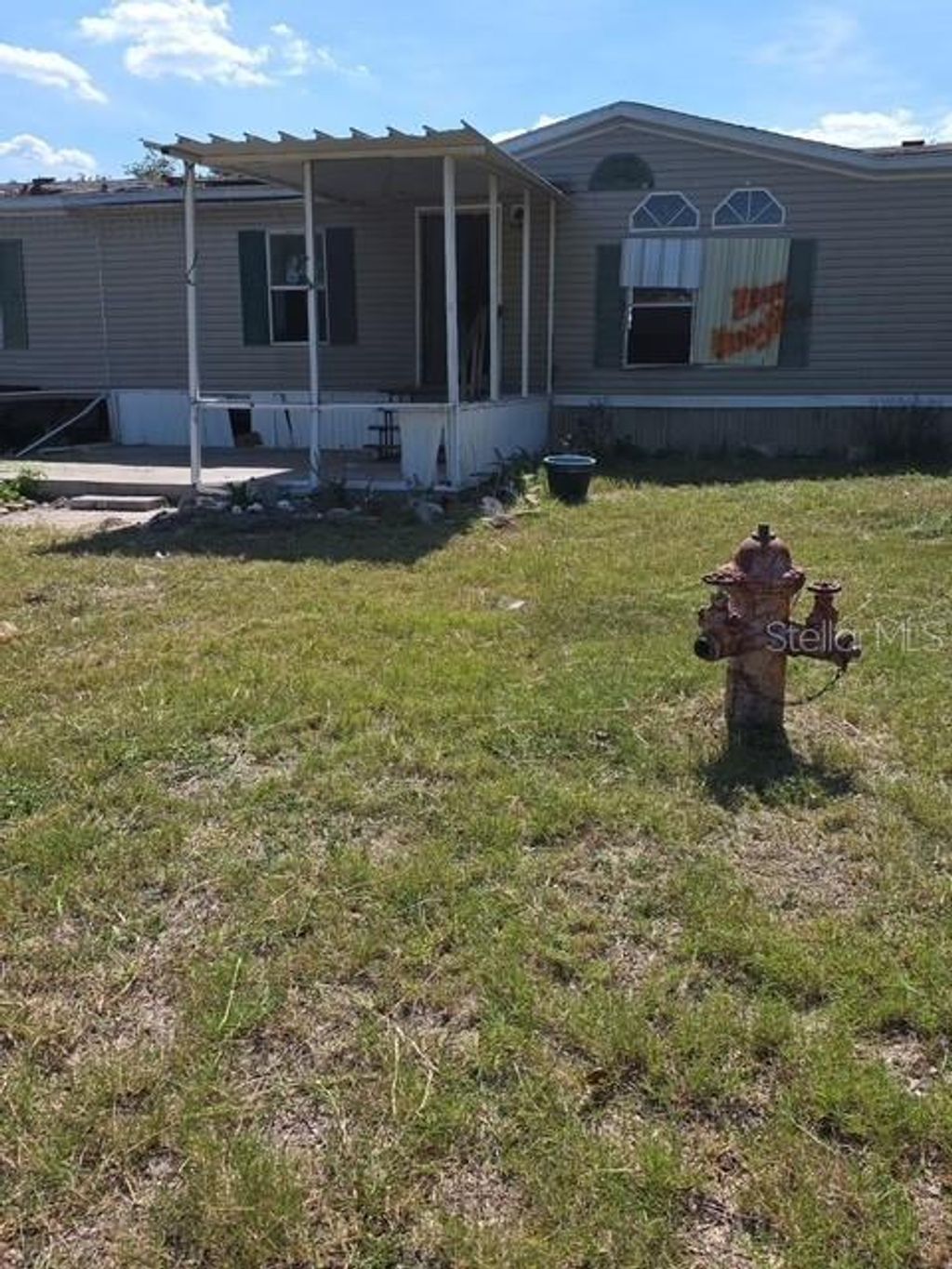 Photo of 1610 Belmont Avenue, Mulberry, FL 33860 (MLS # P4938747)