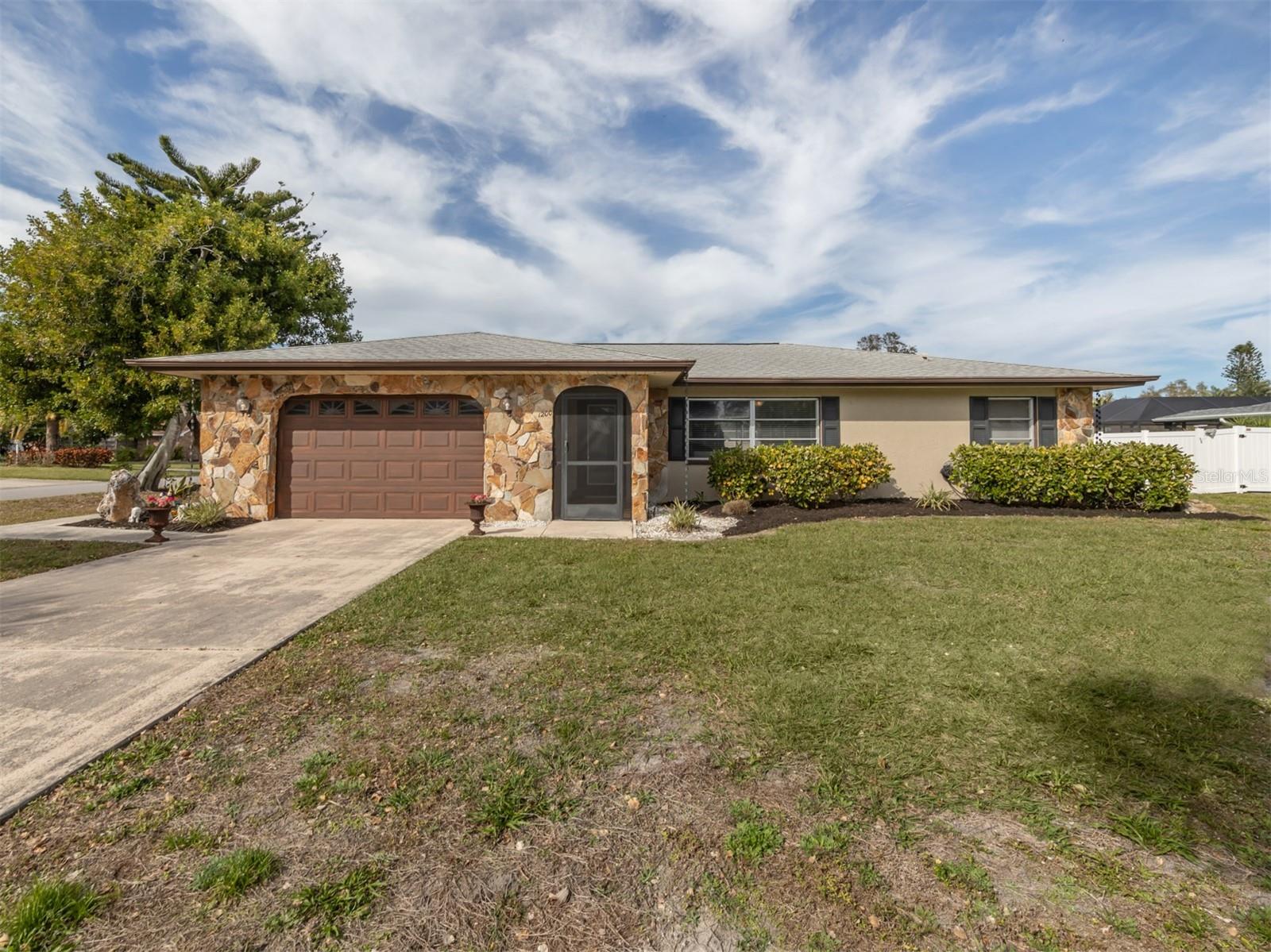 If you've been searching for the perfect combination of charm, space, and unbeatable location—this is the one. Nestled in a quiet, highly desirable neighborhood just minutes from historic Venice Island, pristine Gulf beaches, boutique shops, and local restaurants, this beautifully maintained 3-bedroom, 3-bath home checks every box. Set on an expansive corner lot, this home offers a rare sense of privacy and versatility. Inside, you'll find three spacious bedrooms—each with its own en-suite bath—creating the ideal layout for comfort, convenience, and hosting guests. The oversized third bedroom, with its own private entrance, opens the door to endless possibilities: think in-law suite, guest retreat, home office, or even a second family room. Step outside to your own private oasis—a screened-in pool area where you can relax, entertain, and enjoy the Florida sunshine all year long. The premium corner lot offers extra space to spread out, garden, or simply enjoy the peaceful surroundings. Low HOA fees grant you access to a wealth of resort-style amenities, including a heated pool, clubhouse, shuffleboard, billiards and ping pong room, monthly community events, and even kayak storage with a private launch into scenic Curry Creek. Conveniently located between Sarasota and Punta Gorda airports, this home is the perfect base for travel and exploration—whether you’re planning day trips, beach days, or welcoming out-of-town guests. This isn’t just a home—it’s the lifestyle you've been dreaming of. Opportunities like this are rare, and this one won’t last long. Schedule your private showing today and make this Florida paradise your own!