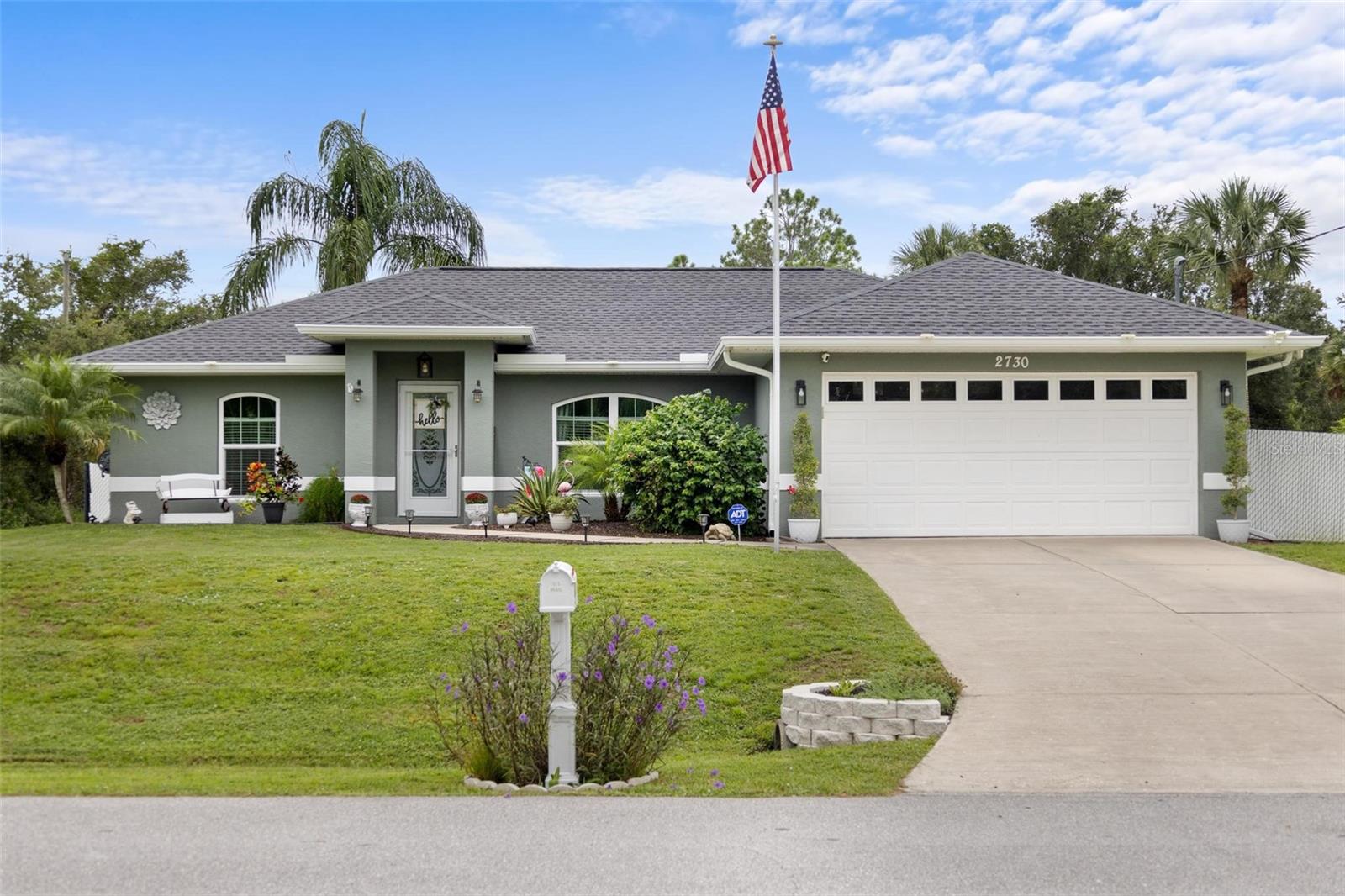 Fall in love with this totally remodeled 3-bedroom, 2-bath, 2-car garage North Port pool home situated on a oversized fenced corner lot with lush landscaping, a charming pergola, and a storage shed. Custom built by Hamsher Homes in 2005, this home has been thoughtfully updated with a new roof (2023), new central A/C (2024), new impact windows (2025), and features like attic insulation, a well pump, and whole-house generator hook-up. Step inside to a bright, open floor plan with vaulted ceilings, a stunning fireplace with color-changing LED lights, and a spacious gourmet kitchen featuring granite countertops, added cabinetry, oversized counter space, and all new stainless steel appliances. Blinds and drapes stay, making it truly move-in ready. The outdoor oasis is a dream come true, with a rescreened lanai, heated pool, and a freshly resurfaced pool deck with custom concrete overlay and LED lighting throughout the pool area and pergola—perfect for morning coffee or evening entertaining. This home offers a rare blend of privacy, style, and comfort in a highly desirable North Port location—paradise truly awaits!