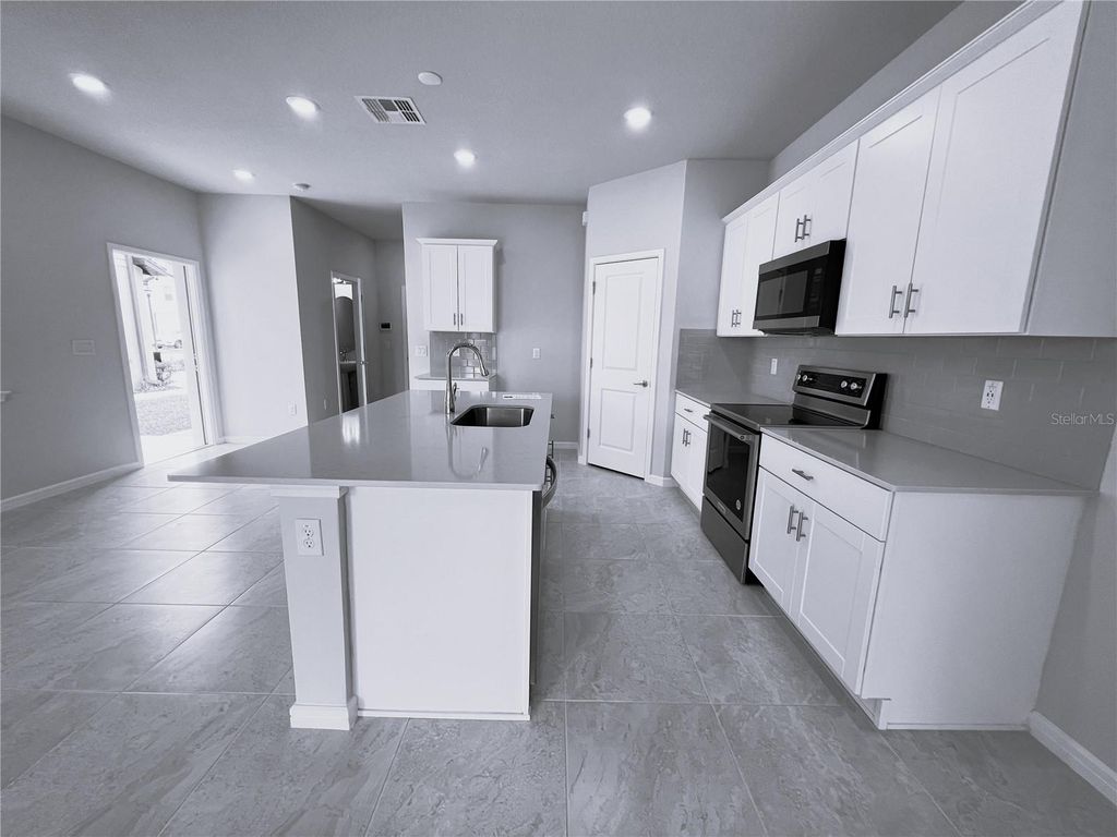 Photo of 19646 Shady Oak Drive, Land O Lakes, FL 34638 (MLS # TB8518455)
