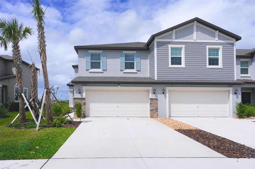 Photo of 10059 Trumpet Honeysuckle Way, San Antonio, FL 33576 (MLS # TB8493876)