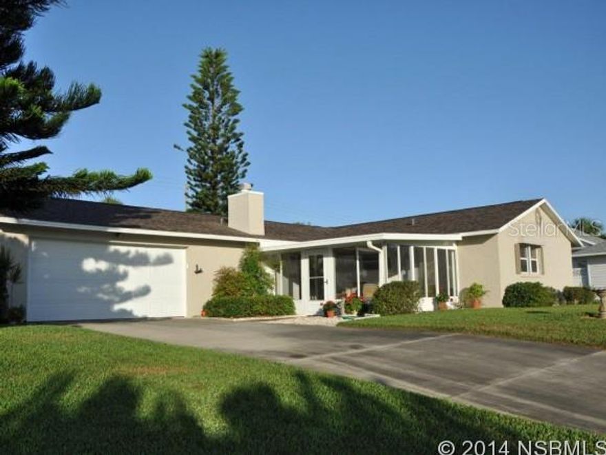 Immaculate beachside pool home, close to no-drive beach access.  Unique corner setting with considerable road frontage.  Screened in pool with lap lane.  Large circular kitchen with breakfast bar.  Considerable closet space including walk-in in master bdrm & guest bdrm & 3 closets in second guest bdrm.  Large fireplace in livingroom.  Oversized garage accommodates boat trailer.  Recent (2012) updates include Elastomeric paint, Owens Corning roof, garage door & stove. Dishwasher 2014. Trane 17.9 SEER HVAC replaced in 2007. Storm shutters for living area windows, slider & front door. See to appreciate. ;Water: City