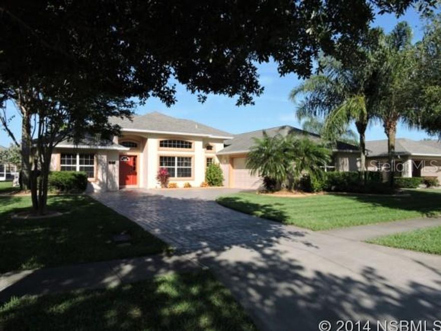 Beautifully maintained 4 bedroom/3 bath pool home overlooking large pond is ready to move in and enjoy the Florida lifestyle. Like-new condition with builder's structural warranty still in effect. Volume ceilings, lighted tray ceilings in den and master suite, split bedroom plan with 3rd bathroom being pool bath. Master suite opens to pool area by way of French doors, formal dining room and spacious breakfast nook overlooking waterfront. Great room opens up to amazing salt water/solar heated pool and huge 64' x 22' screened area with large deck area for entertaining and sunbathing. Spacious waterfront breakfast nook (10' x 10'10"). Concrete block construction with stucco cover, paver driveway, landscape curbing, freshly painted exterior 2014. Located in the Estates section of popular Town Park community, centrally located and only 2 short miles from the Port Orange Pavilion, offering the best of shopping, dining and entertainment. New to the market, a pleasure to show, Owner occupied and cared for, easy to see by appointment. ;Water: City