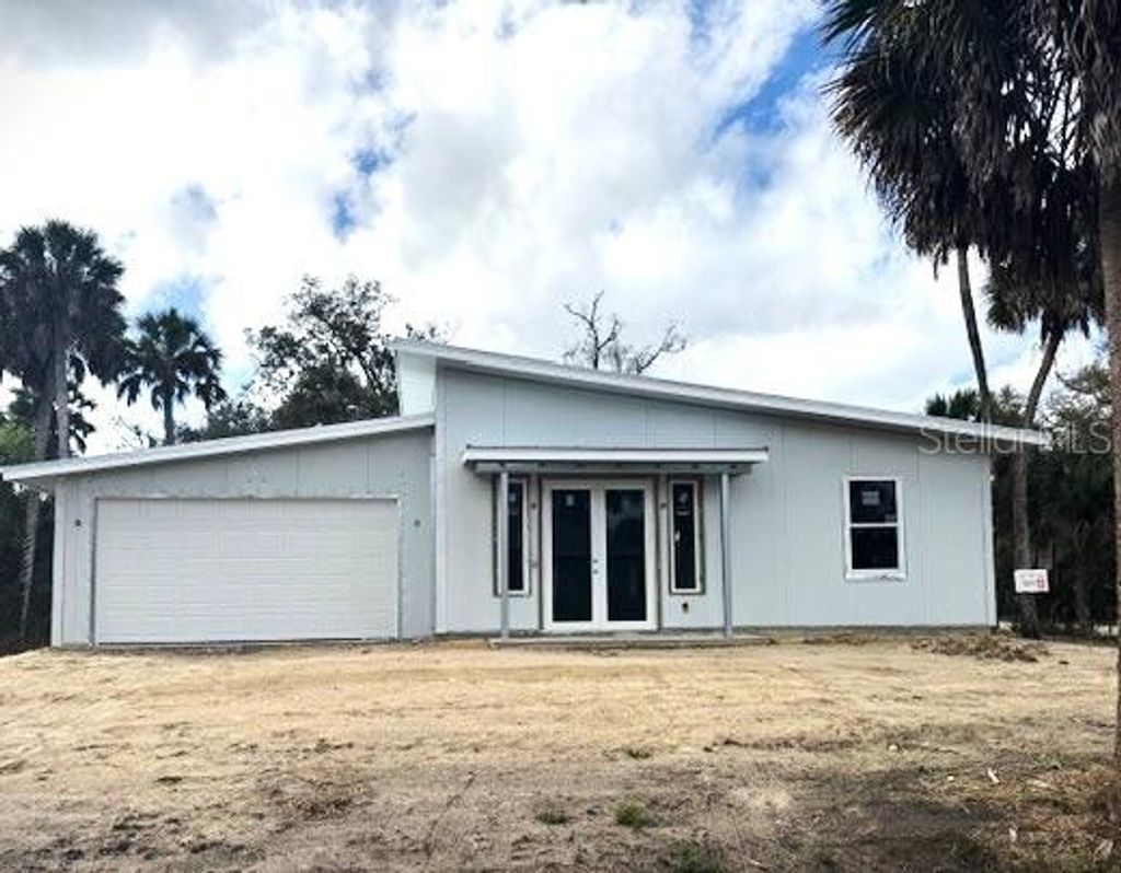 Photo of 16411 Bauers Avenue, Port Charlotte, FL 33954 (MLS # C7524059)