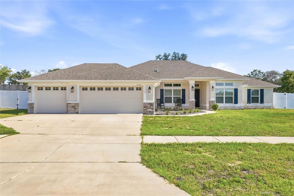 Photo of 12536 Sunset Woods Drive, Spring Hill, FL 34609 (MLS # TB8505816)