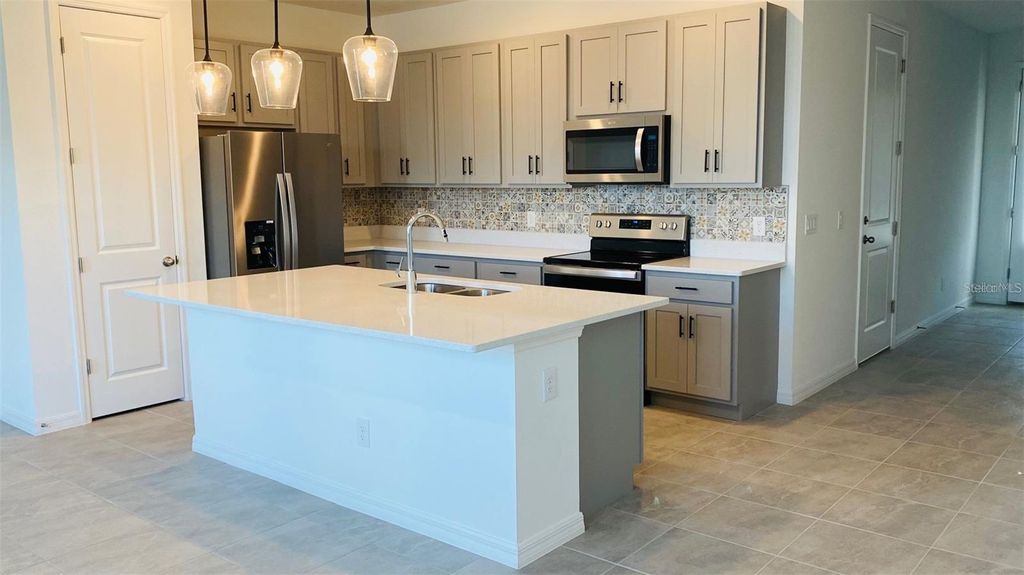 Photo of 1621 Pelican Drive, Davenport, FL 33896 (MLS # O6408678)