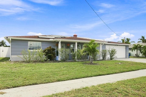 Photo of 1324 Chancellor Drive, Holiday, FL 34690 (MLS # TB8547859)