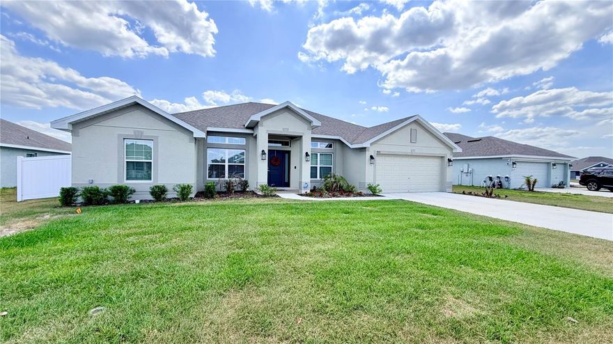Beautiful almost-new home with an amazing open floor plan offering over 2,100 sq. ft. Of living space! Built just 2 years ago, this spacious 4-bedroom, 2-bath home features a formal dining room, oversized family room, versatile flex space, breakfast nook, and a stunning kitchen perfect for entertaining. Enjoy peaceful pond views from the covered and screened lanai, creating the perfect backyard retreat on a generous 1/4-acre lot. The home also includes a 2-car garage and oversized driveway with plenty of parking for family and guests.
The laundry room has been recently upgraded with beautiful wood countertops and custom cabinetry, and includes the washer and dryer. Additional highlights include a finished attic with stair access for extra storage and a whole-house water softener system.
Conveniently located near public transportation, shopping centers, restaurants, and Walmart Supercenter, this home combines comfort, functionality, and location. Schedule your private showing today — don’t miss this incredible opportunity!