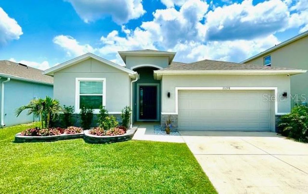 Photo of 33298 Major Oak Drive, Wesley Chapel, FL 33545 (MLS # TB8362140)