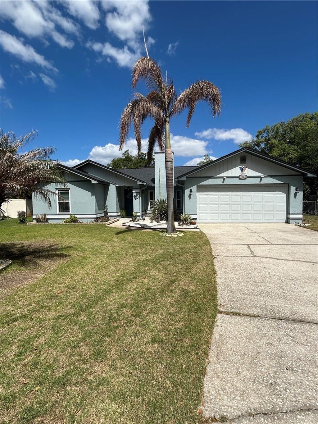 Photo of 1715 Sandalwood Circle SW, Winter Haven, FL 33880 (MLS # P4938520)