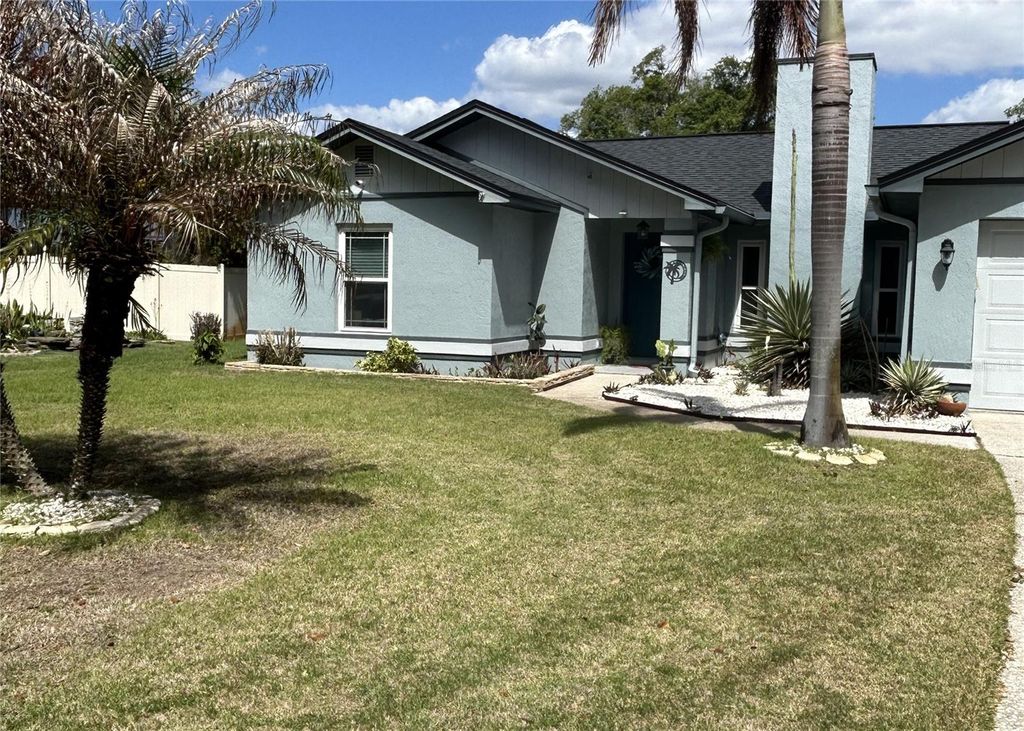 Photo of 1715 Sandalwood Circle SW, Winter Haven, FL 33880 (MLS # P4938520)