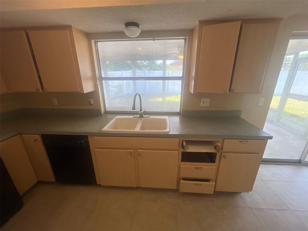 Photo of 6646 Albemarle Parkway, New Port Richey, FL 34653 (MLS # O6331957)