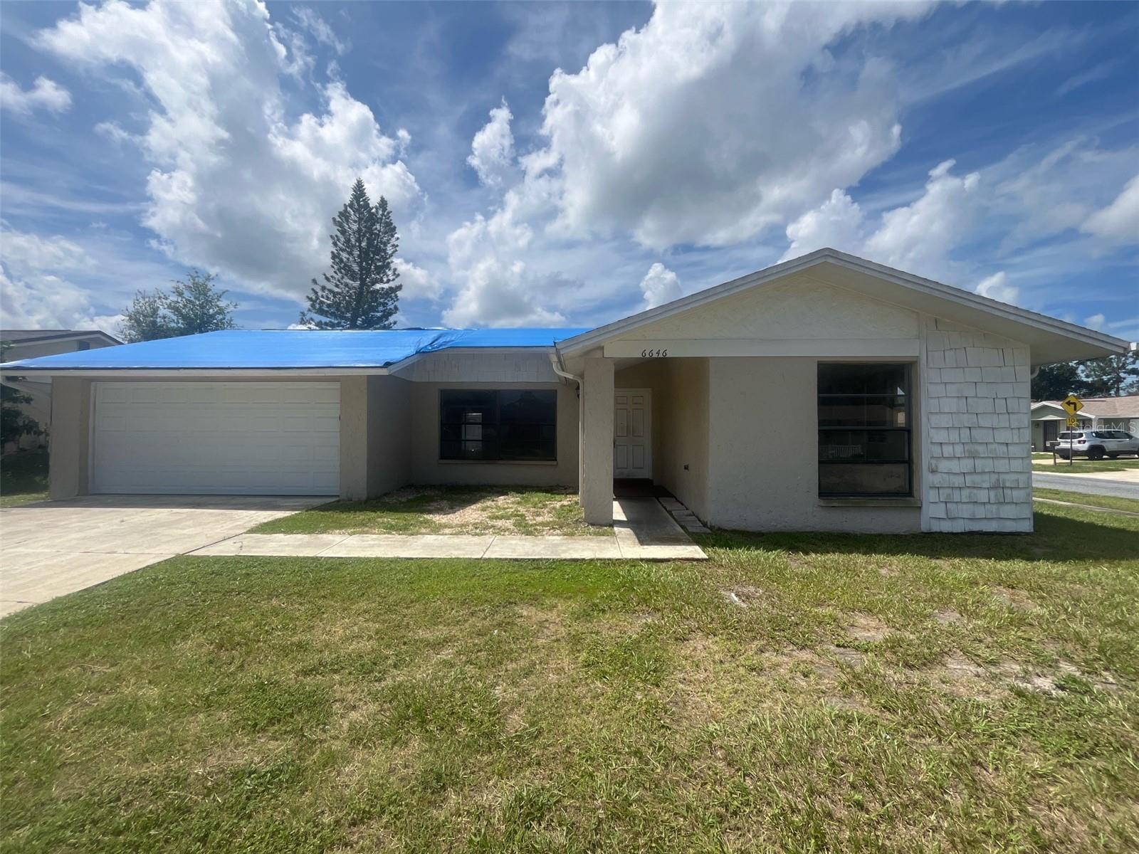 Investor Special or Sweat Equity Opportunity – Ranch-Style Home on Corner Lot
This 3-bedroom, 2-bath ranch-style home offers great potential for investors or buyers looking to build equity through renovation. Located on a desirable corner lot, the property features a two-car garage and a functional layout, making it an excellent candidate for value-add improvements. Whether you're an investor seeking your next project or a homeowner ready to put in some work for future rewards, this property is full of possibilities. Sold as-is. Buyer to verify all information.