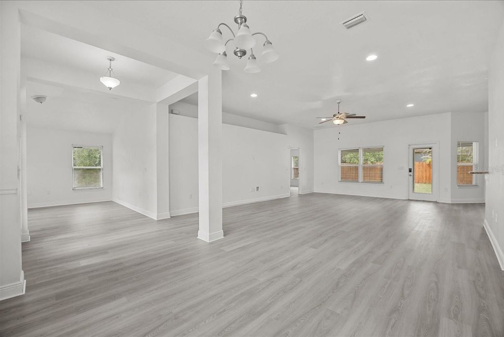 Photo of 201 NE Greenbrier Avenue, Port Saint Lucie, FL 34983 (MLS # FC317425)