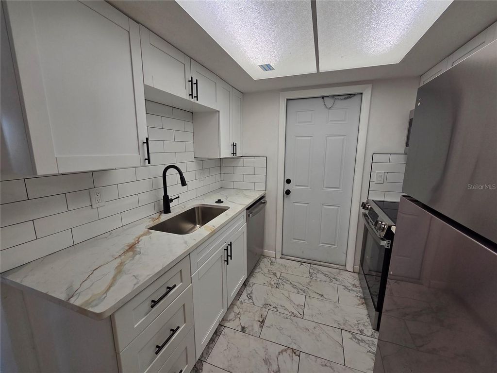 Photo of 606 S Betty Lane #C, Clearwater, FL 33756 (MLS # TB8472387)