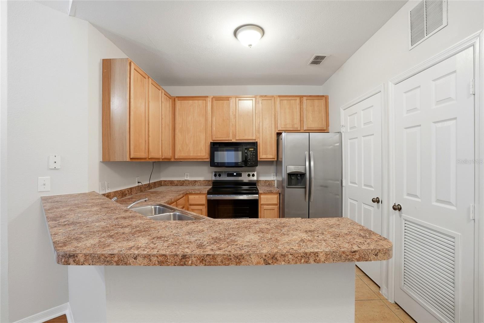 COURTNEY PALMS CONDOMINIUM - Residential