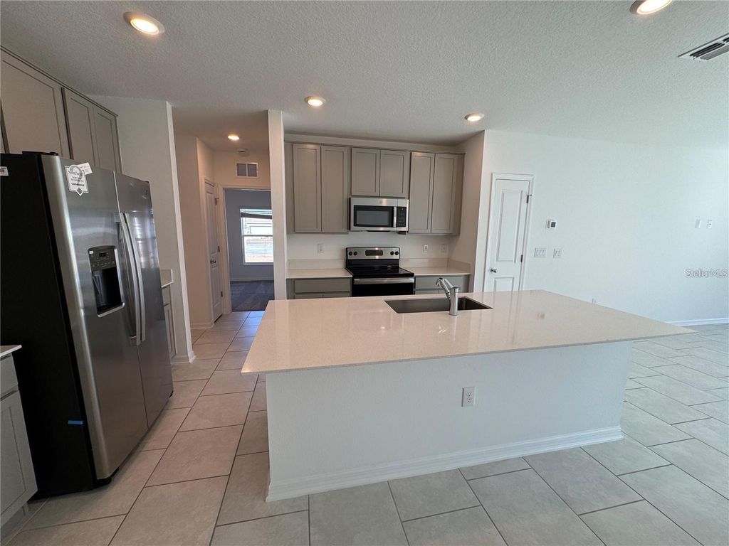 Photo of 669 Bell Prairie Circle, Lake Wales, FL 33859 (MLS # O6382917)