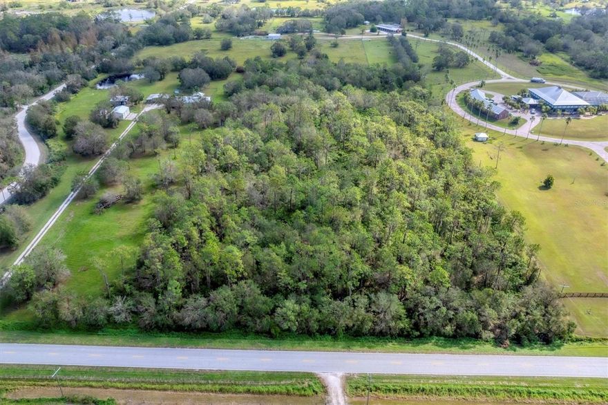 Consider the many possibilities of this 9.2 acre property in a prime location of Eastern Manatee County.  This parcel is heavily wooded and is situated in a sought after region of Manatee County that is known for it's rural charm and convenient location to Lakewood Ranch and surrounding areas. Whether you envision a custom home, agricultural use or future expansion, this property offers so much potential. It has 429 feet of road frontage on County Road 675.  No deed restrictions. Cattle, horses and livestock are allowed. Surrounded by natural beauty with pine trees and oaks, this parcel is located just across from the Hunsader Farms and almost midway between SR 64 and SR 70.  Located just a few driving miles to Lorraine Road, University Boulevard and the Lakewood Ranch area.