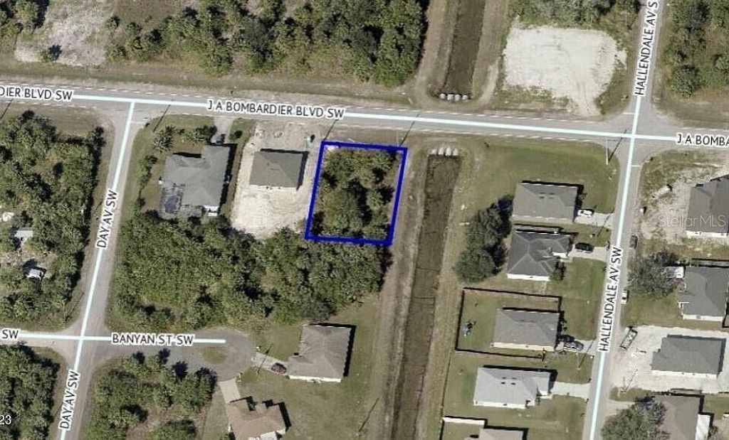 Photo of 612 J A Bombardier Boulevard SW, Palm Bay, FL 32908 (MLS # S5132459)