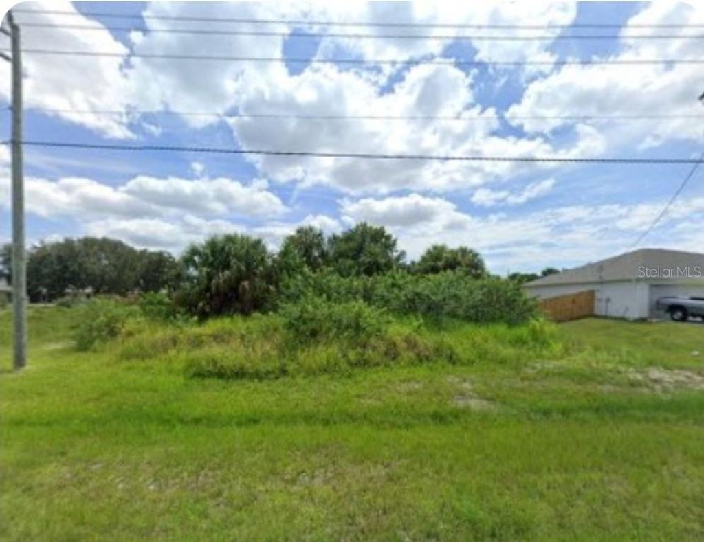 Photo of 612 J A Bombardier Boulevard SW, Palm Bay, FL 32908 (MLS # S5132459)