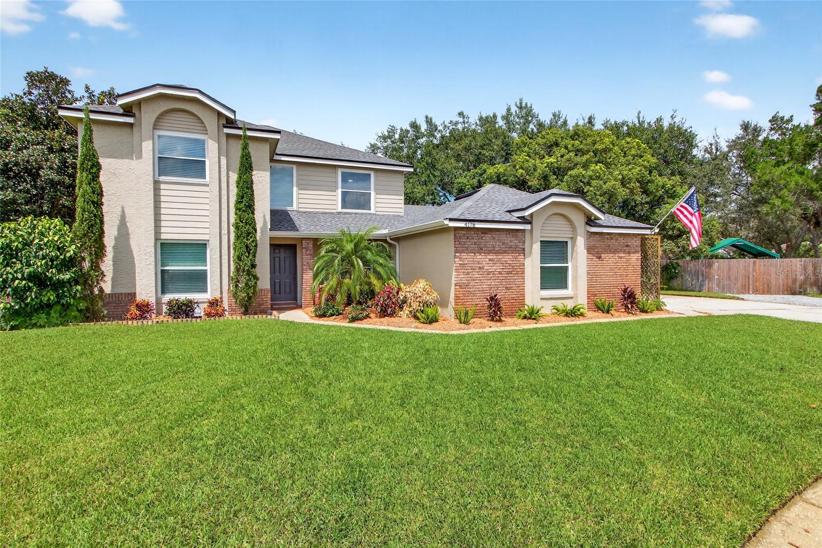 GORGEOUS & LOVINGLY RENOVATED OVIEDO POOL HOME! This home sits on a 0.38-ACRE CUL-DE-SAC lot with a huge fenced private backyard. Fresh landscaping, an extra long driveway, a detached 2-car garage plus a side parking pad and recreational parking canopy greet you. The paradise-like yard is easily maintained by a shallow-well irrigation system. The MANY HOME UPDATES give the owner peace of mind: *Architectural Shingle ROOF (2023) *Salt-water fiberglass POOL WITH BRICK PAVER DECK (2022) *Whole House REPIPE (PEX 2016) & HOT WATER HEATER within last 5 years) *TERMINIX TERMITE BOND *Double Hung/energy-efficient WINDOWS & SLIDER installed (2020) *ALL BATHROOMS HAVE BEEN FULLY REMODELD & UPDATED *INTERIOR & EXTERIOR PAINT (2025) *LUXURY VINYL PLANK FLOORING throughout most of the home *ALL POPCORN CEILINGS HAVE BEEN REMOVED & THE HUGE SCREENED PORCH CEILING HAS BEEN RECENTLY REDONE *NEW FRONT DOORS (2025) & ALL NEW INTERIOR & EXTERIOR LIGHTING *HVAC (2014) annually maintained *2 CAR GARAGE DOOR W/ CHAMBERLAIN OPENER INSTALLED (2019). You will love the spacious kitchen which opens to the great room with wood burning fireplace and the breakfast area overlooking the screened porch, pool, and parklike private backyard!!! Solid wood cabinets, granite countertops, and stainless-steel appliances finish out the kitchen. The stainless-steel washer and dryer convey. This 4-bedroom, 2.5-bathroom, 2 car garage home offers the primary bedroom downstairs (with its own private patio) as well as a formal dining room, office, kitchen, great room (with fireplace), and half bath with laundry room. There are 3 bedrooms upstairs with a full bathroom. Fox Chase is zoned for excellent Oviedo schools and is close to UCF, Full Sail University, Valencia Community College, and Research Park. Convenient shopping, dining, park trails, and entertainment are all close by. Tourist attractions and beaches are within an hour’s drive. Call today for a private showing!