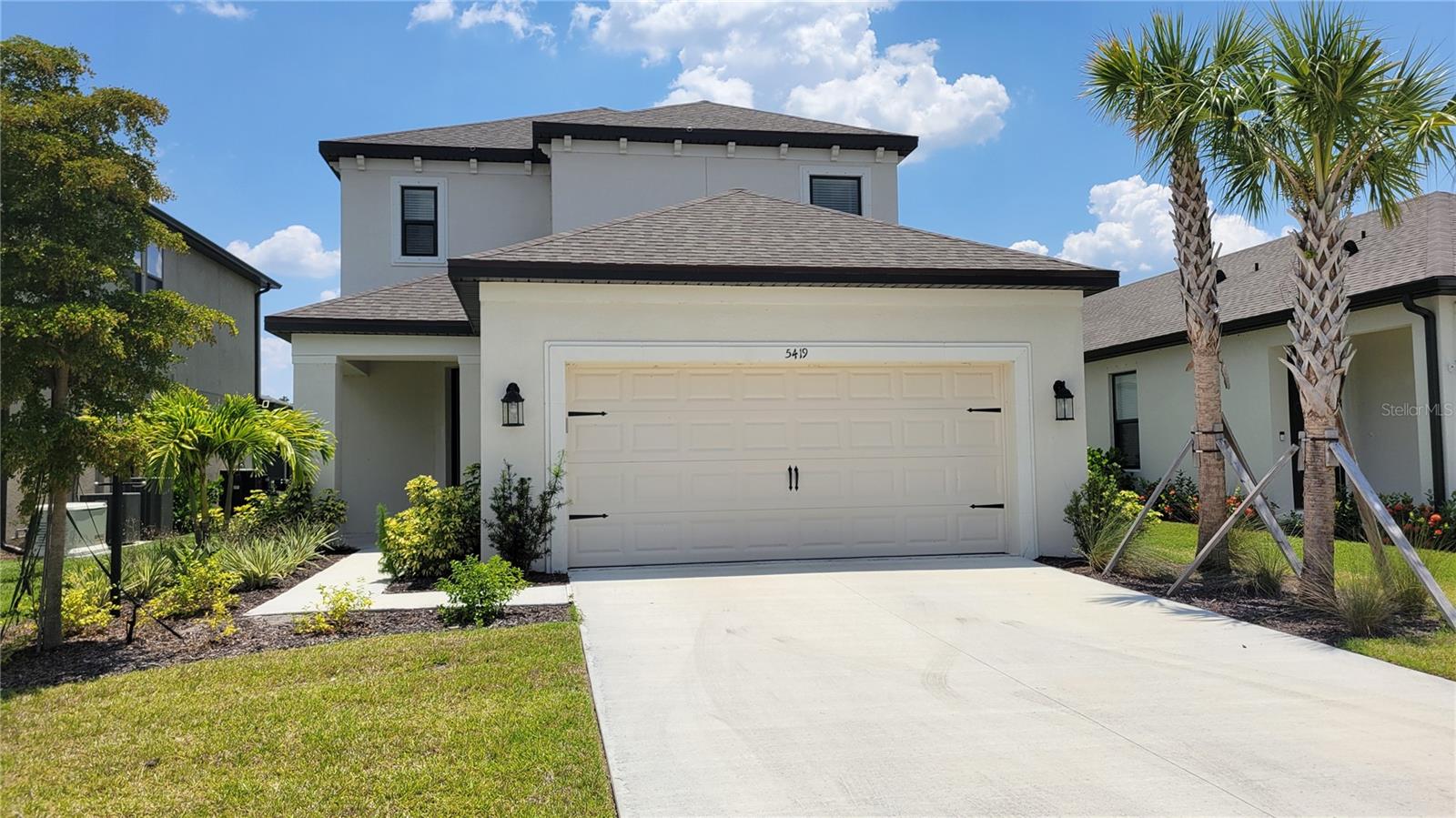 Seasonal/short term ONLY Come vacation and enjoy the Florida life style in a beautiful almost new, spacious home in a resort community. This home has an open light filled floor plan for easy family time and entertaining. The living area has soaring ceilings and clerestory windows to flood this home with sunlight. The kitchen boasts solid wooden cabinetry topped with slab quartz counters with breakfast bar, custom tile backsplash, pantry and stainless steel appliances. The master bedroom is spacious and on the ground floor with water view, en suite and large walk in closet. 2 more bedrooms are upstairs as is a loft lounge area. This home is in a resort community with large heated community pool with cabana, BBQ grilling stations and outdoor dining area, basketball court, dog park, playground and walking trails. This home can now be rented July thru November 2025 at $3800/month + 13% tax. December thru March is available at $8000/month + 13% tax. Create a memorable vacation and start by CALLING TODAY! This community is governed by a homeowners association. Approval may include an application, background screening, fees, and an approval process. Contact the agent for details.