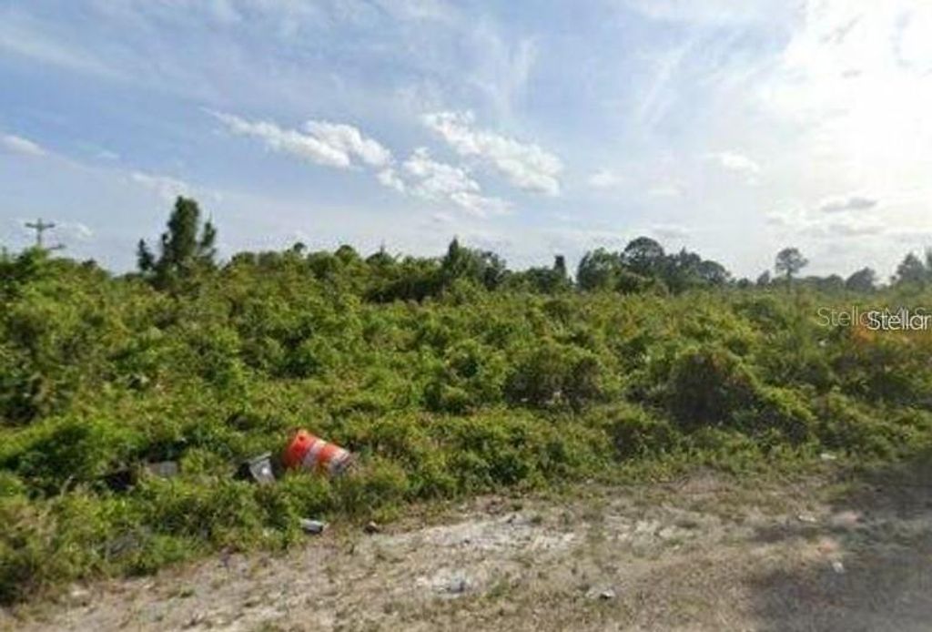 Photo of 912 Mcarthur Court, Lehigh Acres, FL 33974 (MLS # S5148675)