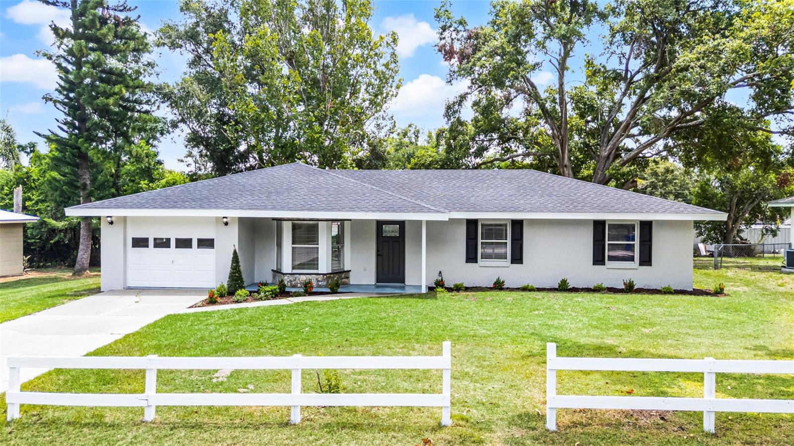 $5000 closing costs incentive being offered by Seller with full price contract! USDA, 100% Financing eligible property so buy this dream home with very little out of pocket! If you like NEW and move in ready without the HOA, this is your home! Completely remodeled with a NEW ROOF, NEW WATER HEATER, new vinyl flooring, new kitchen with quartz counter tops, new bathrooms, top to bottom, new paint inside and out and much more! This open floor plan home also includes a huge indoor laundry room with plenty of room for storage. Enjoy a quiet neighborhood that has the added luxury of its very own boat launch into Lake Haines and the Winter Haven Chain of Lakes! Bring your boat to enjoy some fun on the water! This home was also built with all doorways 36 inches wide so all bathrooms and bedrooms, are wheelchair accessible, something you don't see often! Central Park is just a short walk offering pet friendly walking trails, Softball and Football field (with lights), basketball courts and a new playground. Enjoy the small-town charm and scenic lakes of Lake Alfred with Winter Haven and Lakeland just a short drive away! This one won't last! Schedule your showing today!