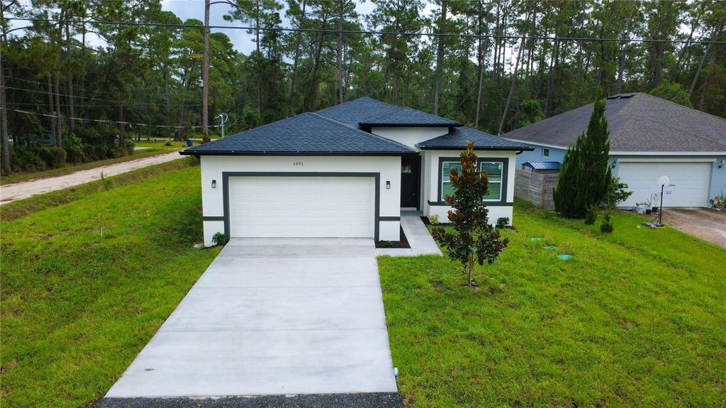 Photo of 1491 9th Avenue, Deland, FL 32724 (MLS # S5136533)